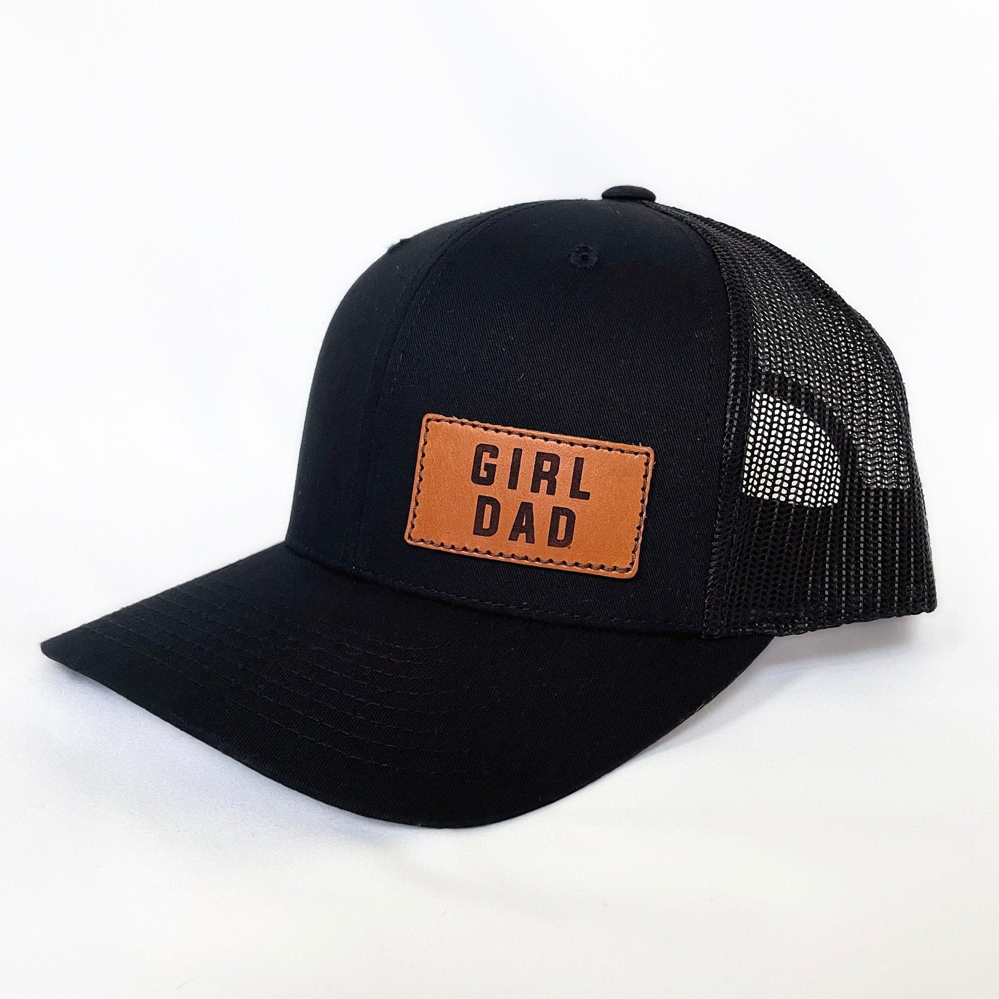 Girldad® Offset Black/Black Leather Patch Trucker Hat